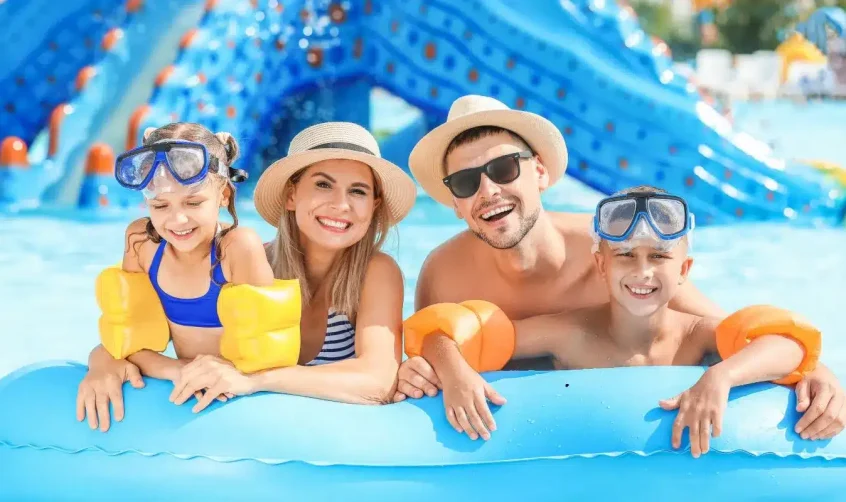 Happy family with two children enjoying the pool at SeaWorld Abu Dhabi