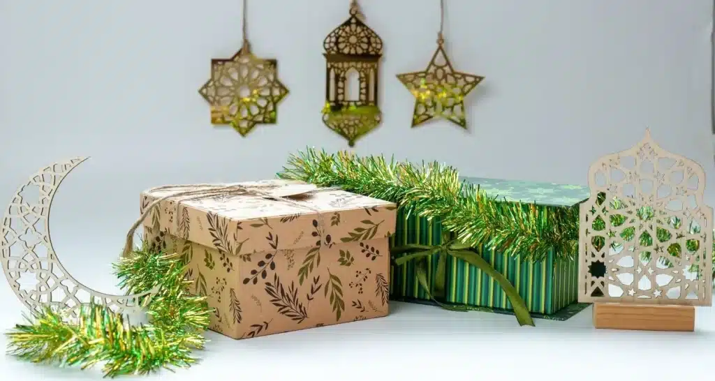 Festive gift boxes with crescent and lantern accents styled for Ramadan decorations